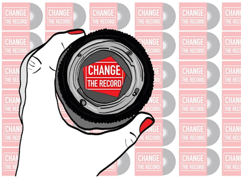 Illustrated graphic of a hand holding an optical glass magnifier over a sheet of 'Change the Record logos' with one logo in the viewer
