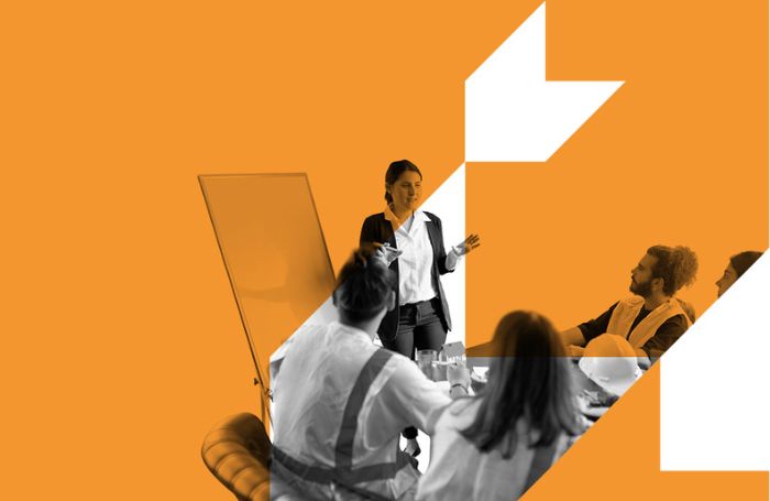 A team of architects discussing a topic in a meeting LARGEjpg