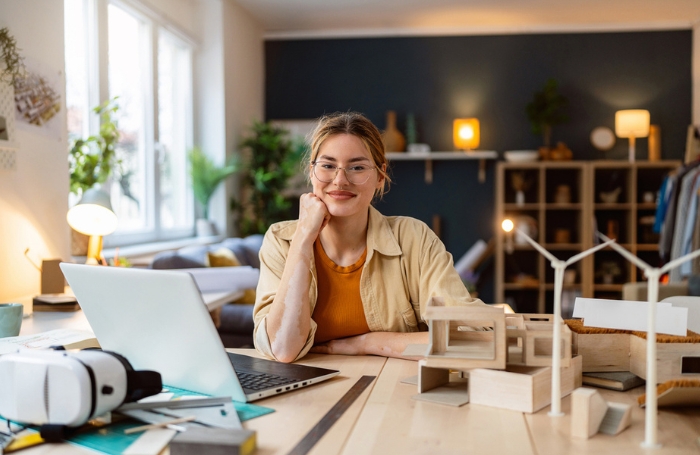 Architect in a small practice office sitting at her desk GC LARGEjpg