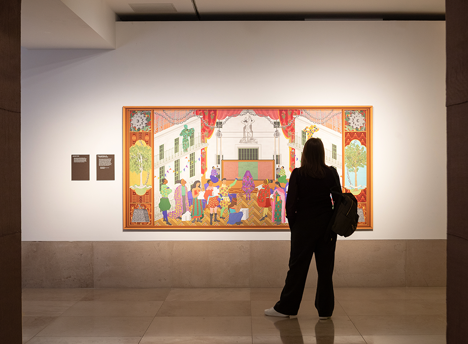 Photo of a woman viewing a painting for Raise the Roof Building for Change Agnese Sanvito 950png