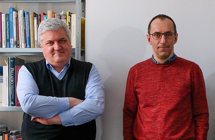 Pier Vittorio Aureli with arms crossed and Martino Tattara standing DOGMA Marc Baert 700x455jpg
