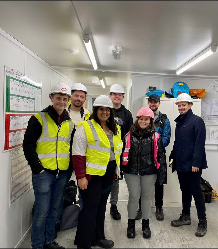 group of students from LJMU on s site visit with mentor from Ryder Architecture Portraitjpg
