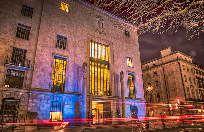 Access RIBA info 66 Portland Place at night with car lights 700x455jpg