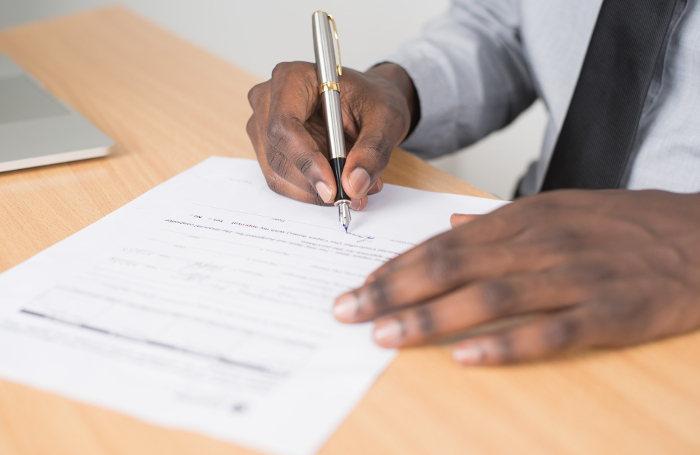 Signing a contract 700x455jpeg