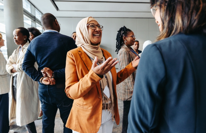 Multicultural architects at a networking eventjpg