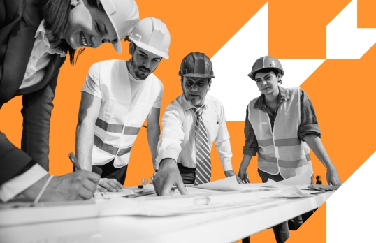 A group of architects wearing hard hats looking at designs with orange background