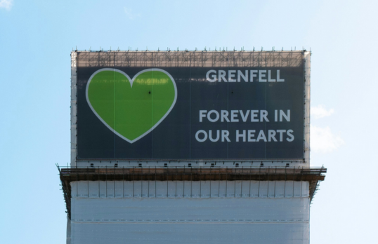 Grenfell Tower with green heart wrapping 