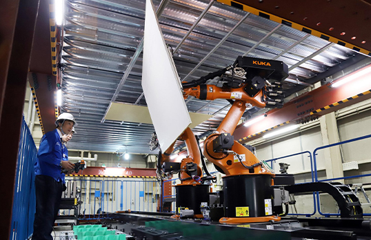RoboBuddy Floor robot and factory worker 