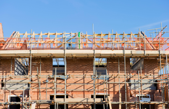 Scaffolding on a brick residential building 