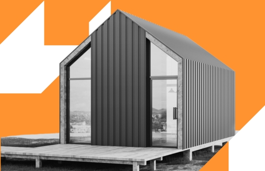 modern selfbuild house on bright orange background with white chevrons 