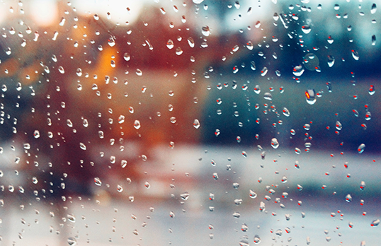 Water droplets on glass window.