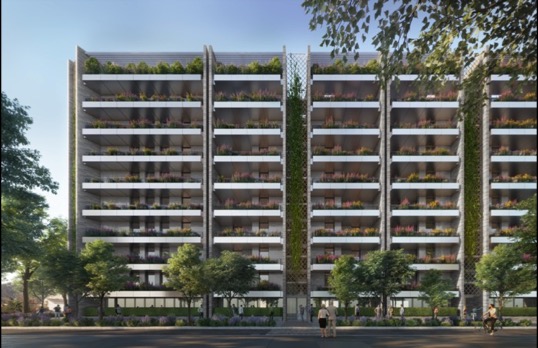 Modern brutalist inspired apartment block with balconies bedecked in greenery set back from the road by trees and gardens.