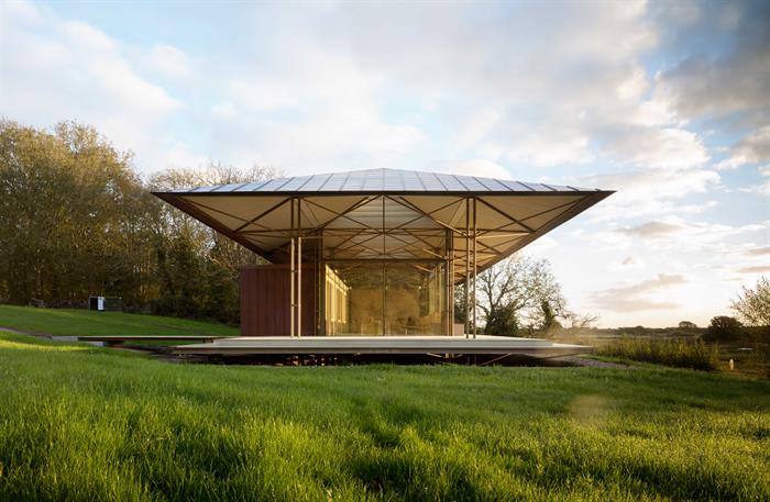 Saltmarsh House open concept roof with grass and marsh background