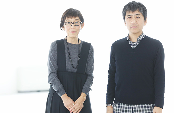 Kazuyo Sejima and Ryue Nishizawa, Sanaa, standing wearing dark colours