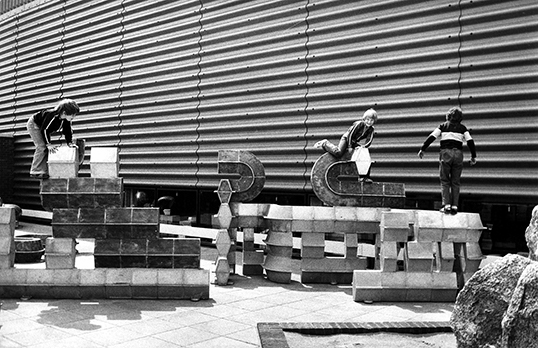 Habitat warehouse, Wallingford, Oxfordshire: children playing on the sculpture by Eduardo Paolozzi