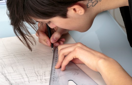 An architect drawing a building 