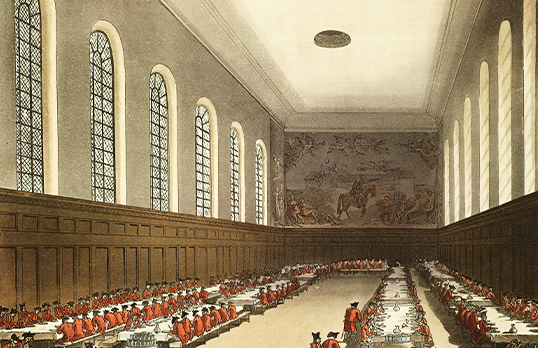 Coloured illustration of the dining hall of the Royal Hospital in Chelsea with soldiers in red coats sitting at long tables
