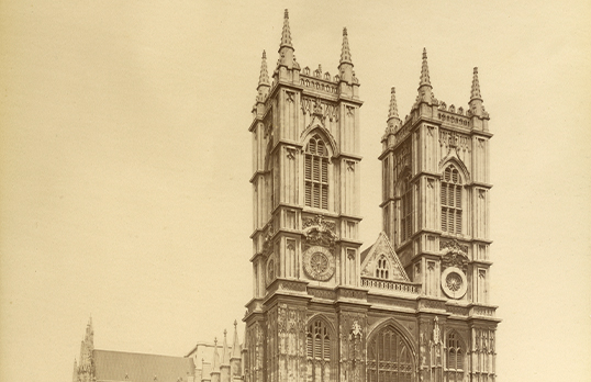 Sepia photograph of the front exterior of Westminster Abbey in London
