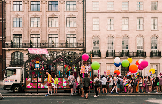 OUT of Space - RIBA staff and members at a pride parade with balloons