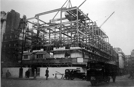 RIBA HQ - black and white photo of building construction with cranes and scaffolding