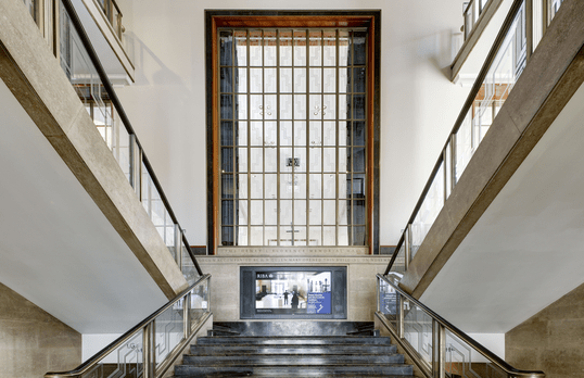 Main central staircase and Art Deco window at 66 Portland Place